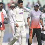 India-s-captain-Shubman-Gill--C--walks-back-to-th