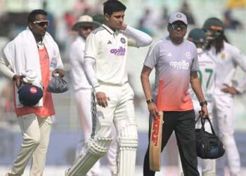 India-s-captain-Shubman-Gill--C--walks-back-to-th