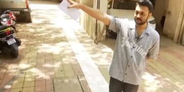 Society Controversy: मुंबई की एक हाउसिंग सोसायटी में धार्मिक परंपरा के लिए बनाई गई लाइन, बनी बहस का कारण